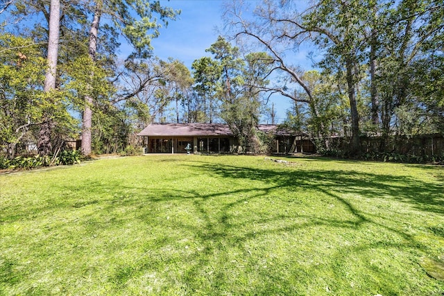 view of yard featuring fence