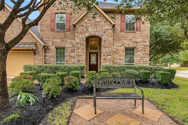 view of front of property featuring a garage