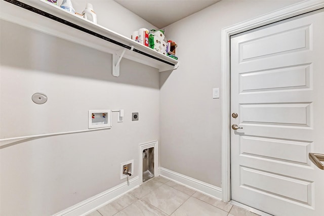 laundry area featuring hookup for a washing machine, gas dryer hookup, electric dryer hookup, laundry area, and baseboards