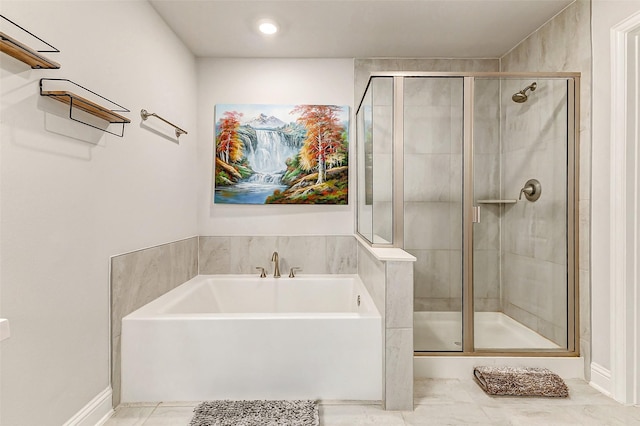 full bathroom featuring a shower stall and a bath