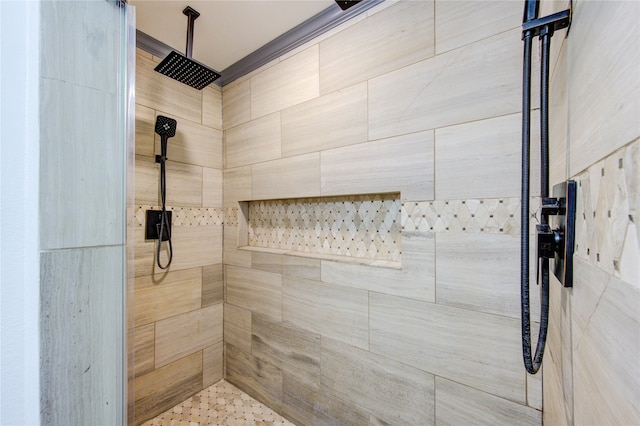 full bathroom with tiled shower