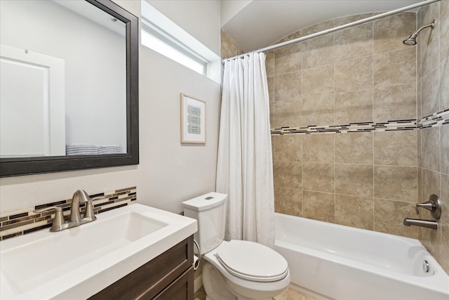 bathroom featuring tasteful backsplash, shower / bathtub combination with curtain, toilet, and vanity