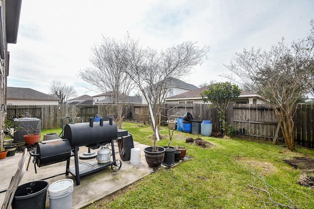 view of yard featuring cooling unit, a patio area, and a fenced backyard