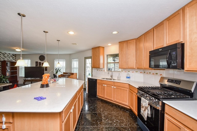 kitchen with decorative backsplash, light countertops, black appliances, a sink, and recessed lighting