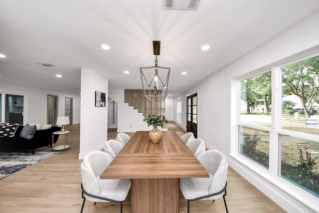 dining space with visible vents, recessed lighting, stairs, and light wood finished floors