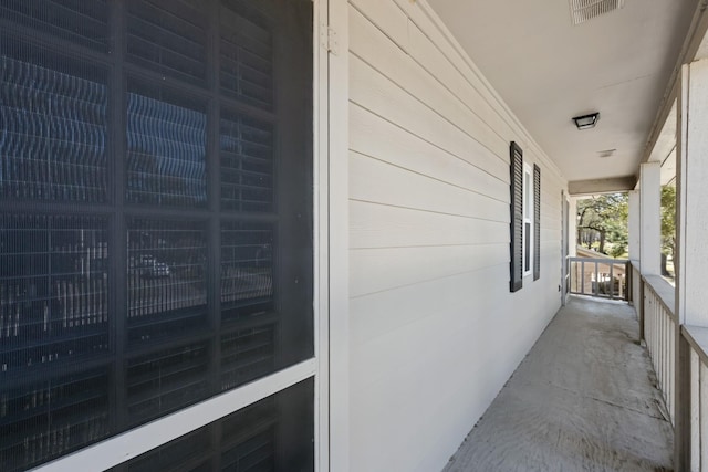 exterior space featuring covered porch and visible vents