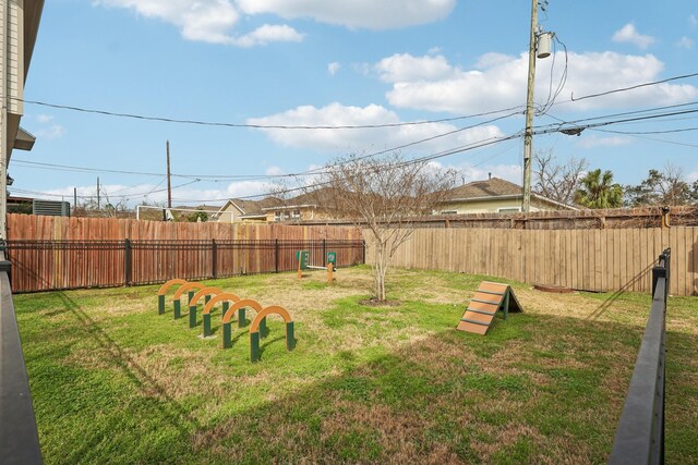 view of yard with fence