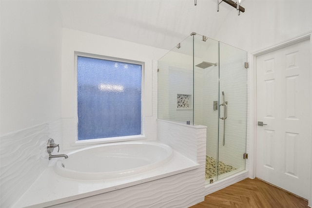 full bathroom with a stall shower and a bath