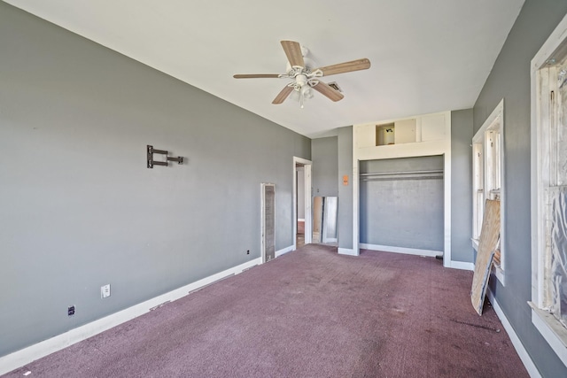 unfurnished bedroom with a ceiling fan, a closet, baseboards, and carpet flooring