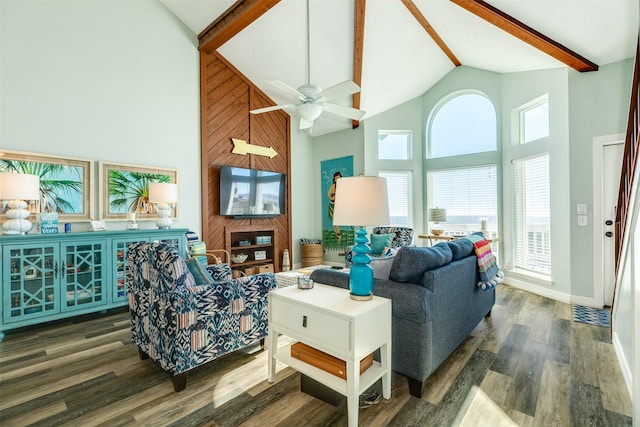 living room featuring ceiling fan, wood finished floors, high vaulted ceiling, beamed ceiling, and baseboards