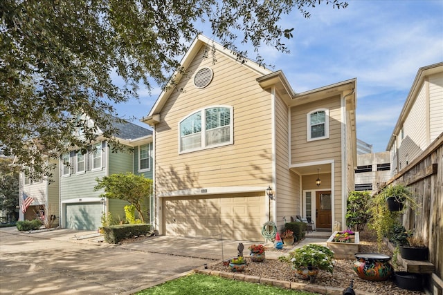 view of front of house with a garage and concrete driveway