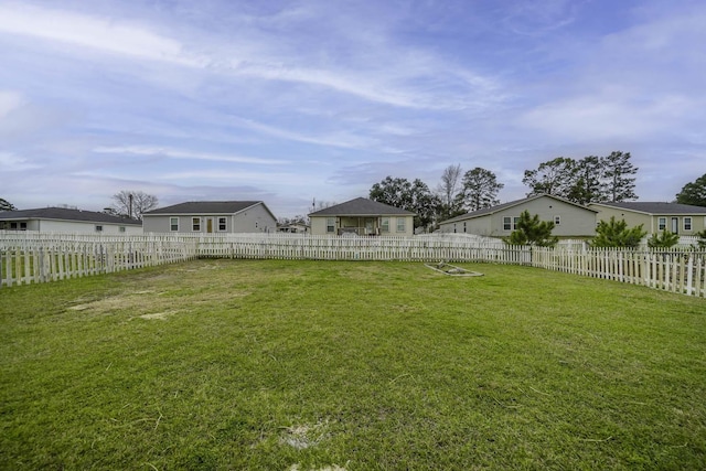 view of yard featuring a fenced backyard