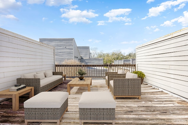 deck with an outdoor hangout area