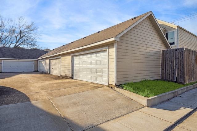 garage with fence