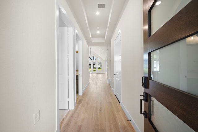 9975 Monarch Landing Cv, Willis, TX 77318 - hallway featuring light wood finished floors, recessed lighting, and baseboards