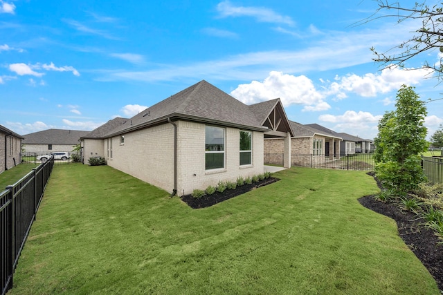9975 Monarch Landing Cv, Willis, TX 77318 - view of side of property with brick siding and a shingled roof