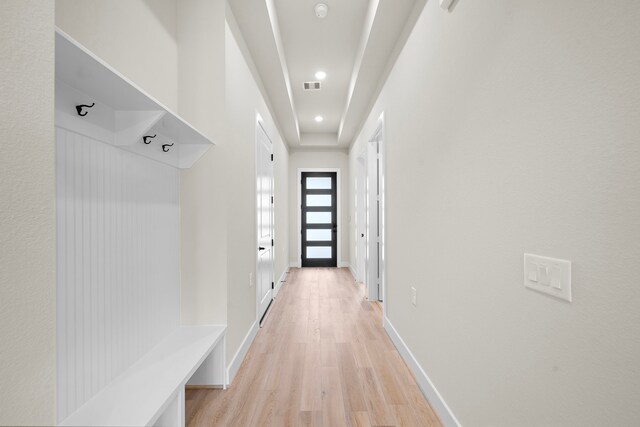 9975 Monarch Landing Cv, Willis, TX 77318 - mudroom with light wood-style flooring, recessed lighting, and baseboards