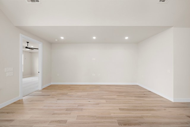 9975 Monarch Landing Cv, Willis, TX 77318 - empty room with recessed lighting, light wood-type flooring, and baseboards