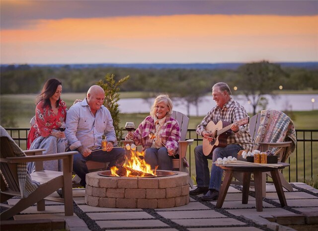 9975 Monarch Landing Cv, Willis, TX 77318 - view of property's community with a fire pit
