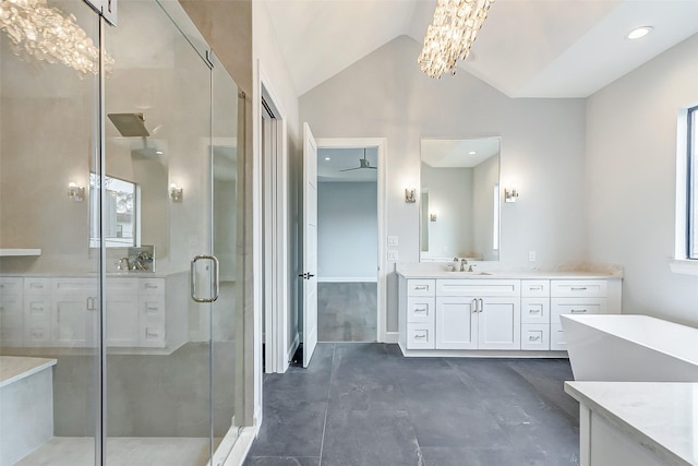 full bathroom featuring a stall shower, a notable chandelier, lofted ceiling, and vanity