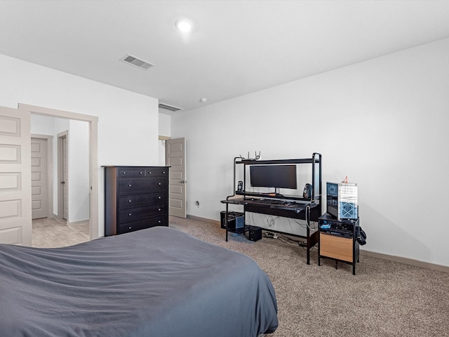 bedroom featuring carpet, visible vents, and baseboards