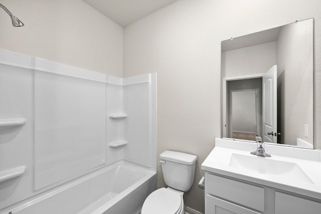 full bath with toilet,  shower combination, and vanity