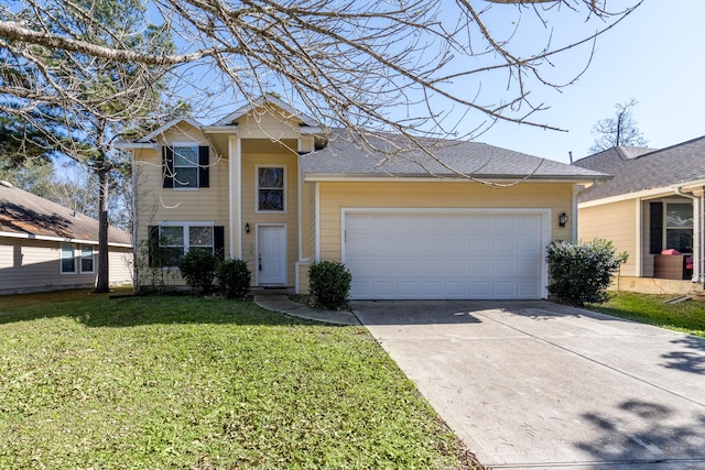 traditional-style home with driveway, a front lawn, an attached garage, and a shingled roof