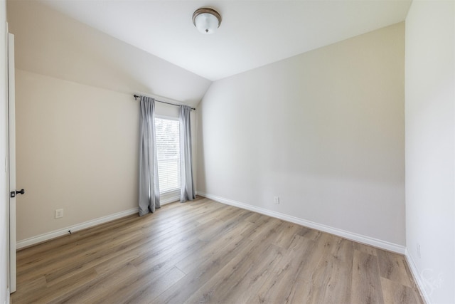 4903 Cancun Hills Ct, Fulshear, TX 77441 - empty room with light wood finished floors and lofted ceiling