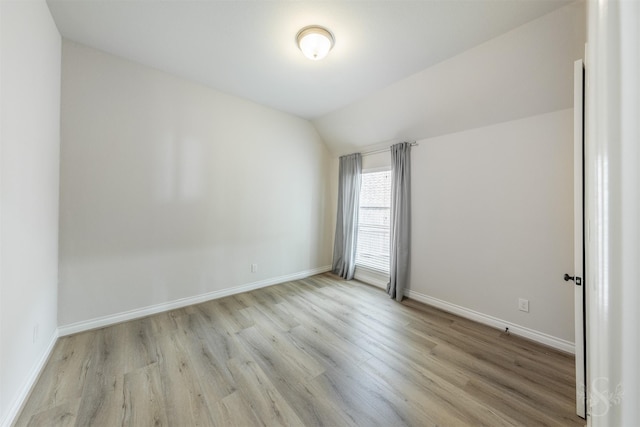 4903 Cancun Hills Ct, Fulshear, TX 77441 - unfurnished room featuring wood finished floors and lofted ceiling