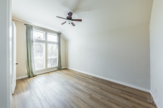 4903 Cancun Hills Ct, Fulshear, TX 77441 - spare room featuring ceiling fan, wood finished floors, and vaulted ceiling