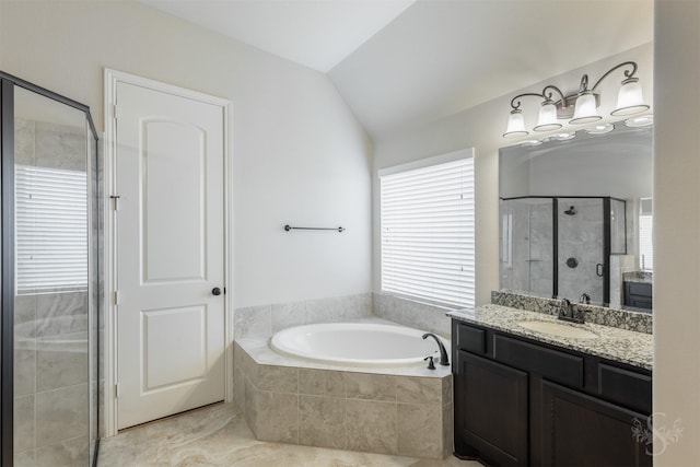 4903 Cancun Hills Ct, Fulshear, TX 77441 - full bath featuring vanity, a garden tub, a shower stall, lofted ceiling, and tile patterned floors