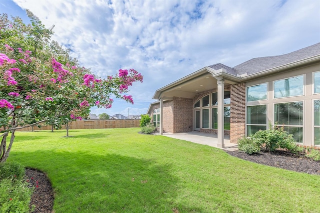 4903 Cancun Hills Ct, Fulshear, TX 77441 - fenced backyard featuring a patio