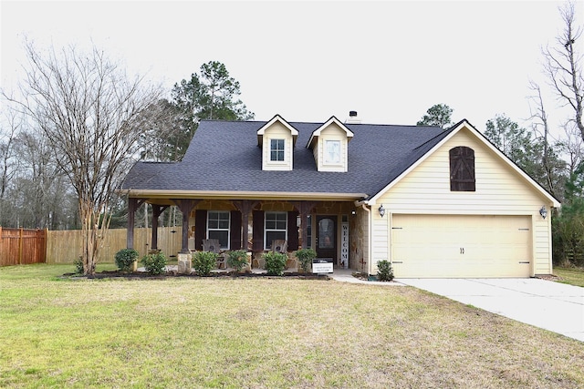 view of front of home featuring concrete driveway, covered porch, a front yard, fence, and a garage