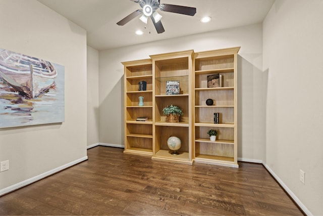 interior space featuring a ceiling fan, recessed lighting, baseboards, and wood finished floors