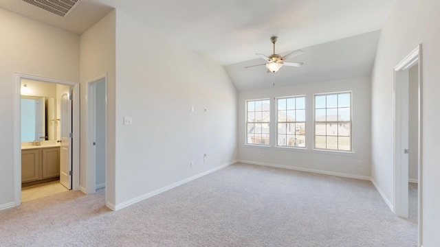 2011 Sunflower Ct, Sugar Land, TX 77498 - empty room with light colored carpet, ceiling fan, lofted ceiling, and baseboards