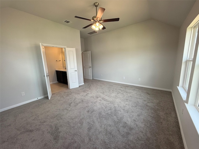 2011 Sunflower Ct, Sugar Land, TX 77498 - unfurnished bedroom with vaulted ceiling, carpet floors, and ceiling fan