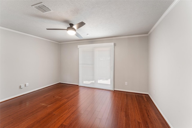 unfurnished room with baseboards, visible vents, a ceiling fan, wood-type flooring, and ornamental molding