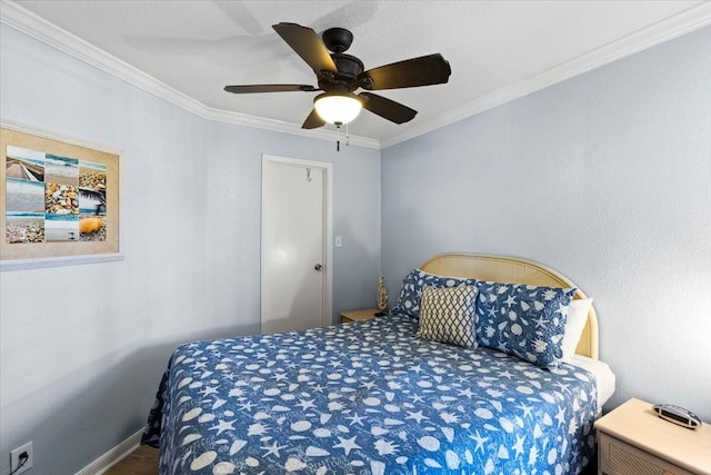 bedroom featuring ceiling fan, ornamental molding, and baseboards