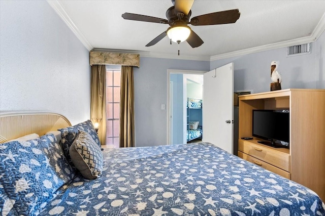 bedroom featuring ceiling fan, ornamental molding, and visible vents