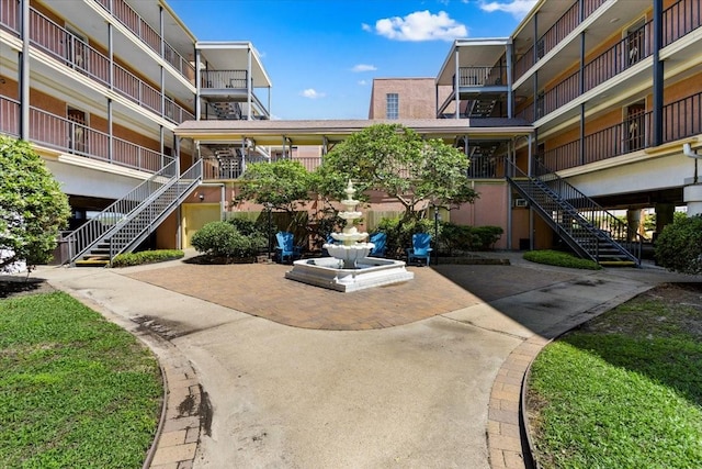 view of home's community with stairs