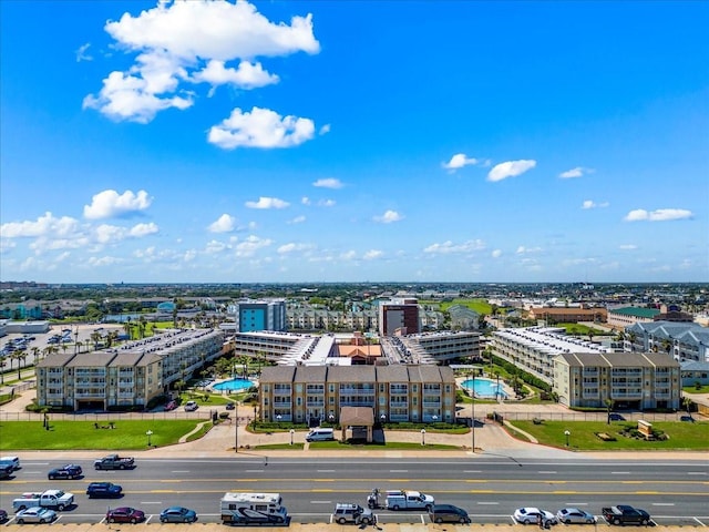 birds eye view of property with a city view