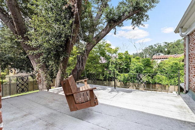 view of patio with fence