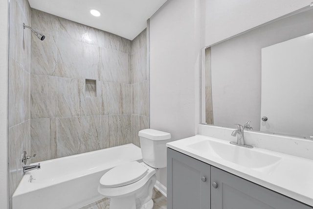 full bath with tub / shower combination, vanity, toilet, and recessed lighting