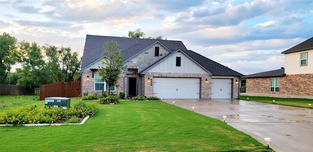 view of front of property featuring a front lawn, driveway, board and batten siding, roof with shingles, and a garage