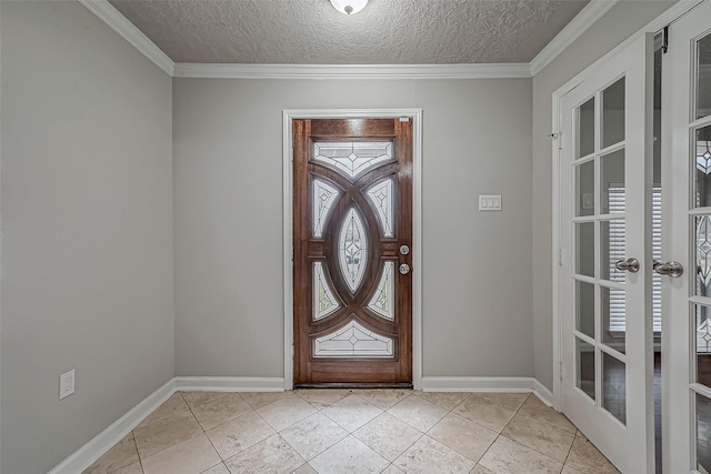 foyer featuring french doors, a textured ceiling, baseboards, and light tile patterned floors