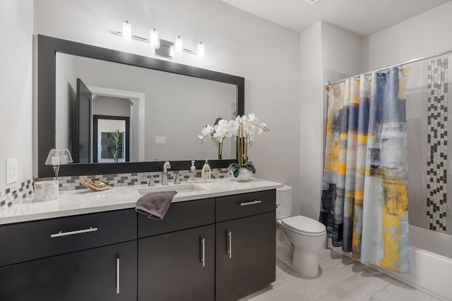 full bath with shower / tub combo, backsplash, vanity, and toilet