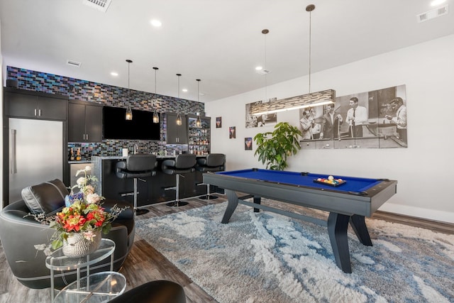 rec room with recessed lighting, pool table, wood finished floors, a community bar, and visible vents