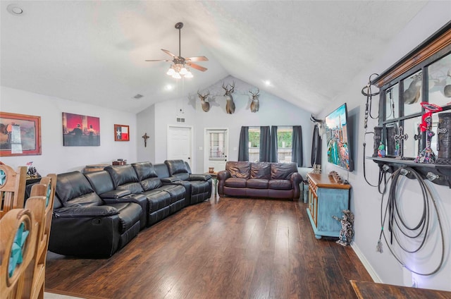 living room featuring lofted ceiling, visible vents, dark wood-type flooring, ceiling fan, and a textured ceiling