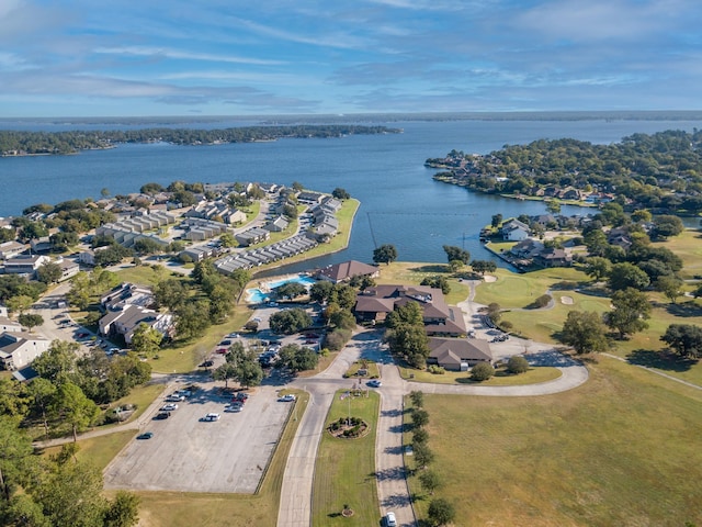 birds eye view of property featuring a water view and a residential view