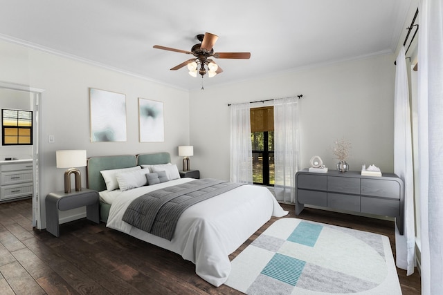 bedroom with ceiling fan, ornamental molding, dark wood finished floors, and connected bathroom